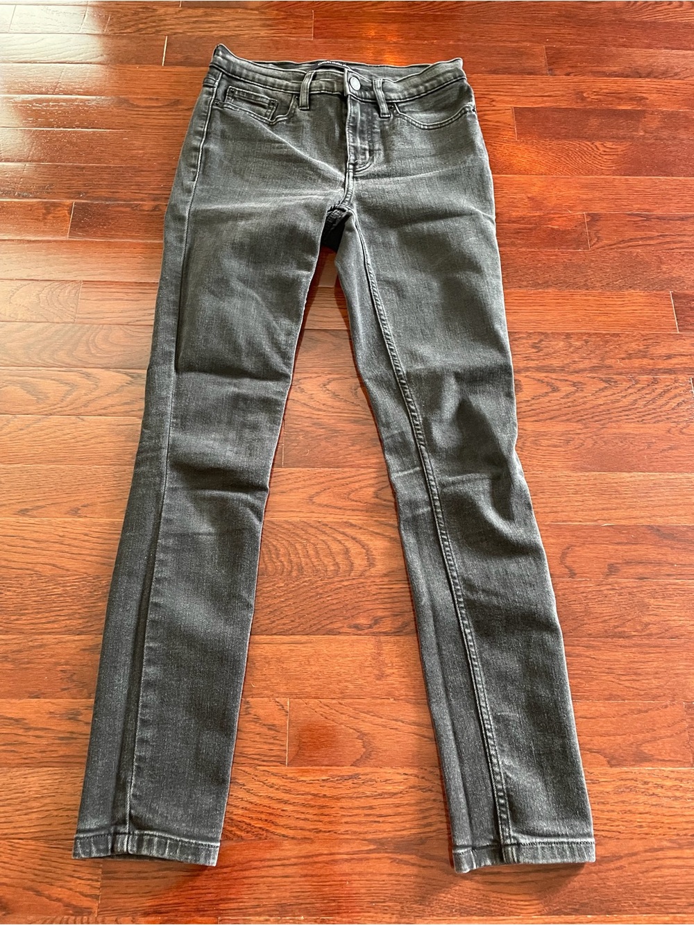 Women’s Calvin Klein Faded Grey/Black Mid Rise Skinny Jeans (size 26)